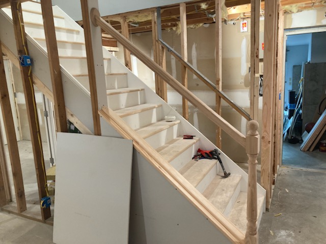 Basement staircase framing by Rome Leite Home Improvement