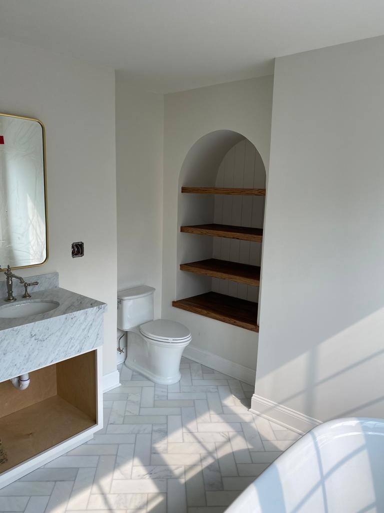 Bathroom vanity and toilet nook remodel by Rome Leite Home Improvement