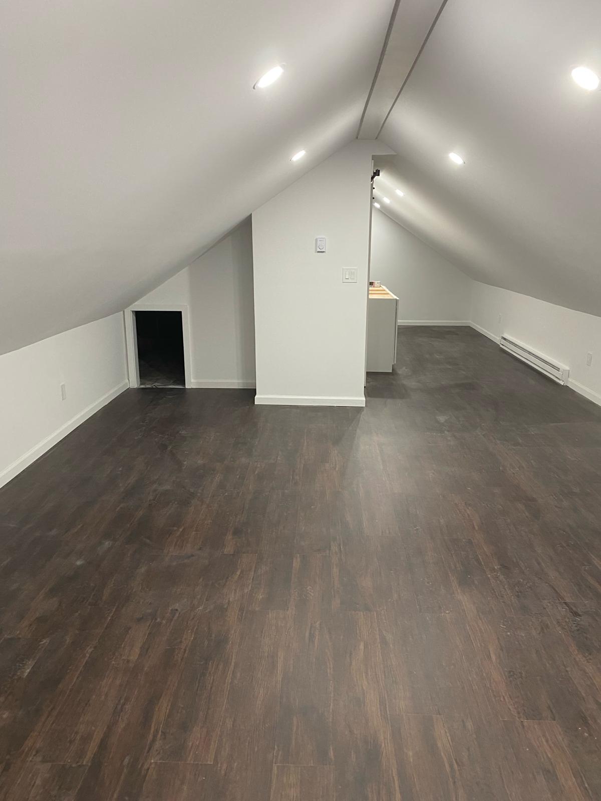 Finished attic conversion by Rome Leite Home Improvement