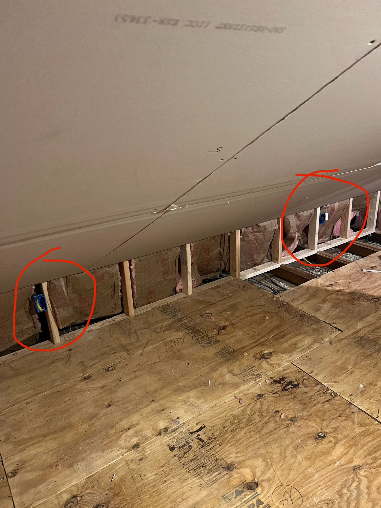 Unfinished attic ceiling and knee wall framing with insulation by Rome Leite Home Improvement in Danbury, CT