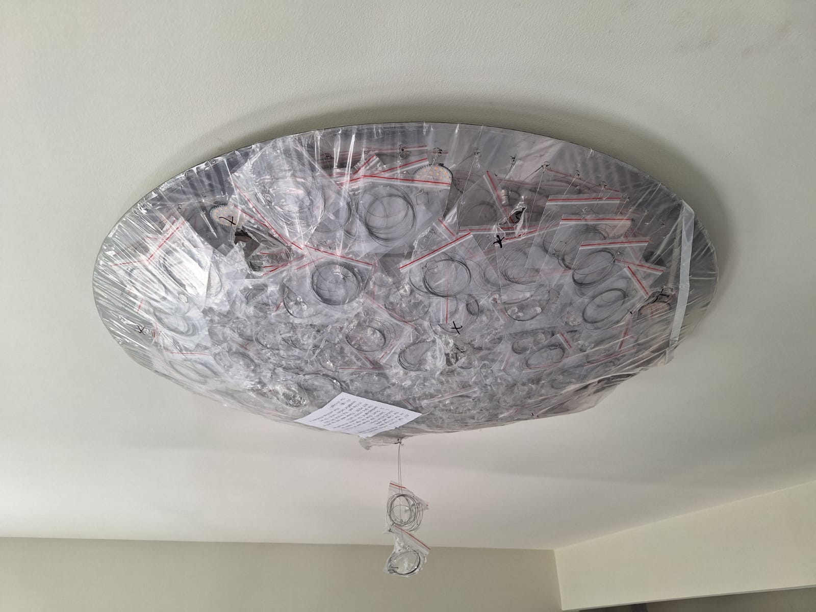 Ceiling light fixture installation by Rome Leite Home Improvement